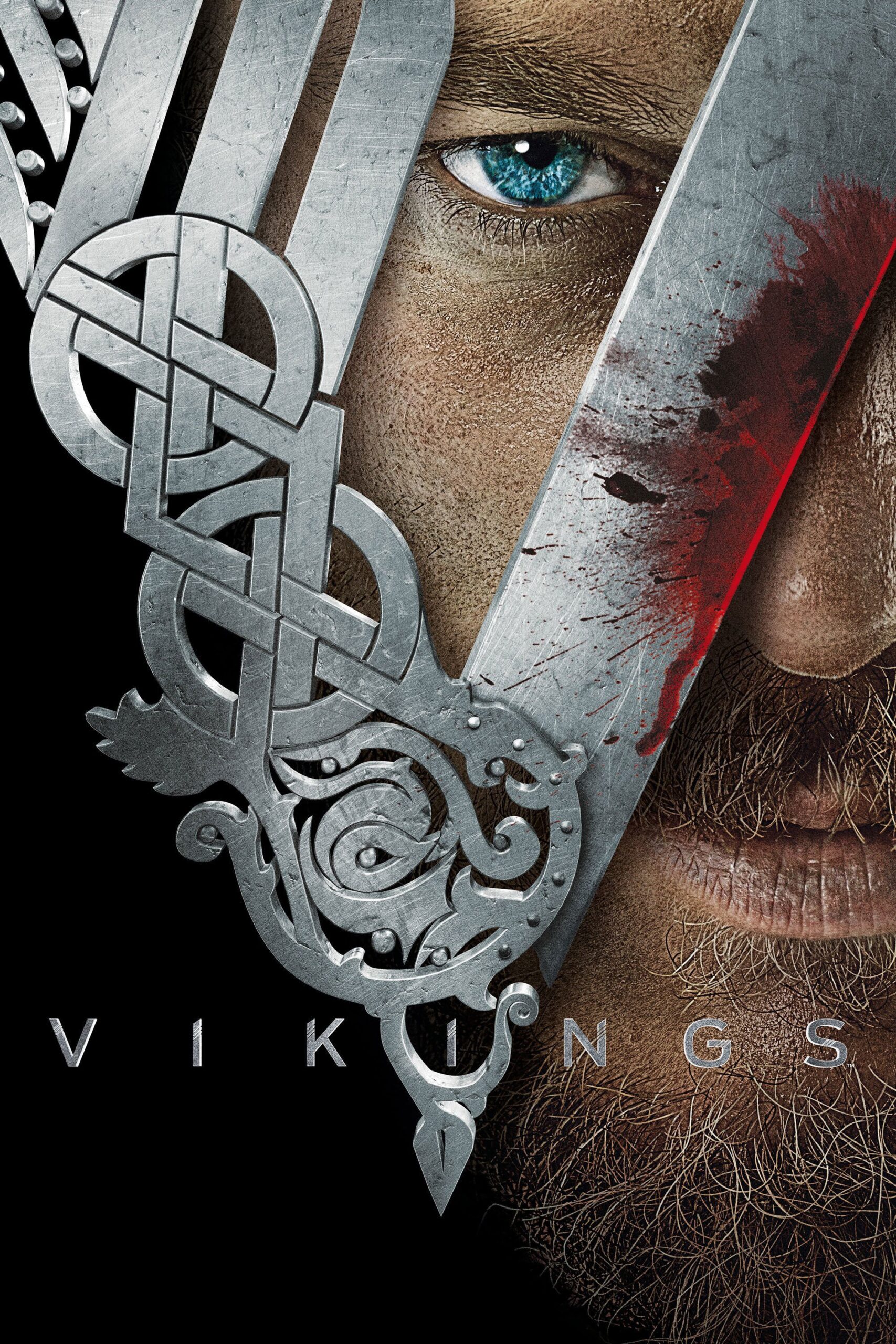 A close-up of a man’s intense blue eye and face with a metallic Viking helmet, bloodstain, and ornate design captures the spirit of ancient warriors. The word VIKINGS appears at the bottom, evoking legendary tales brought vividly to life—much like epic series you can discover on IPTV Italy.